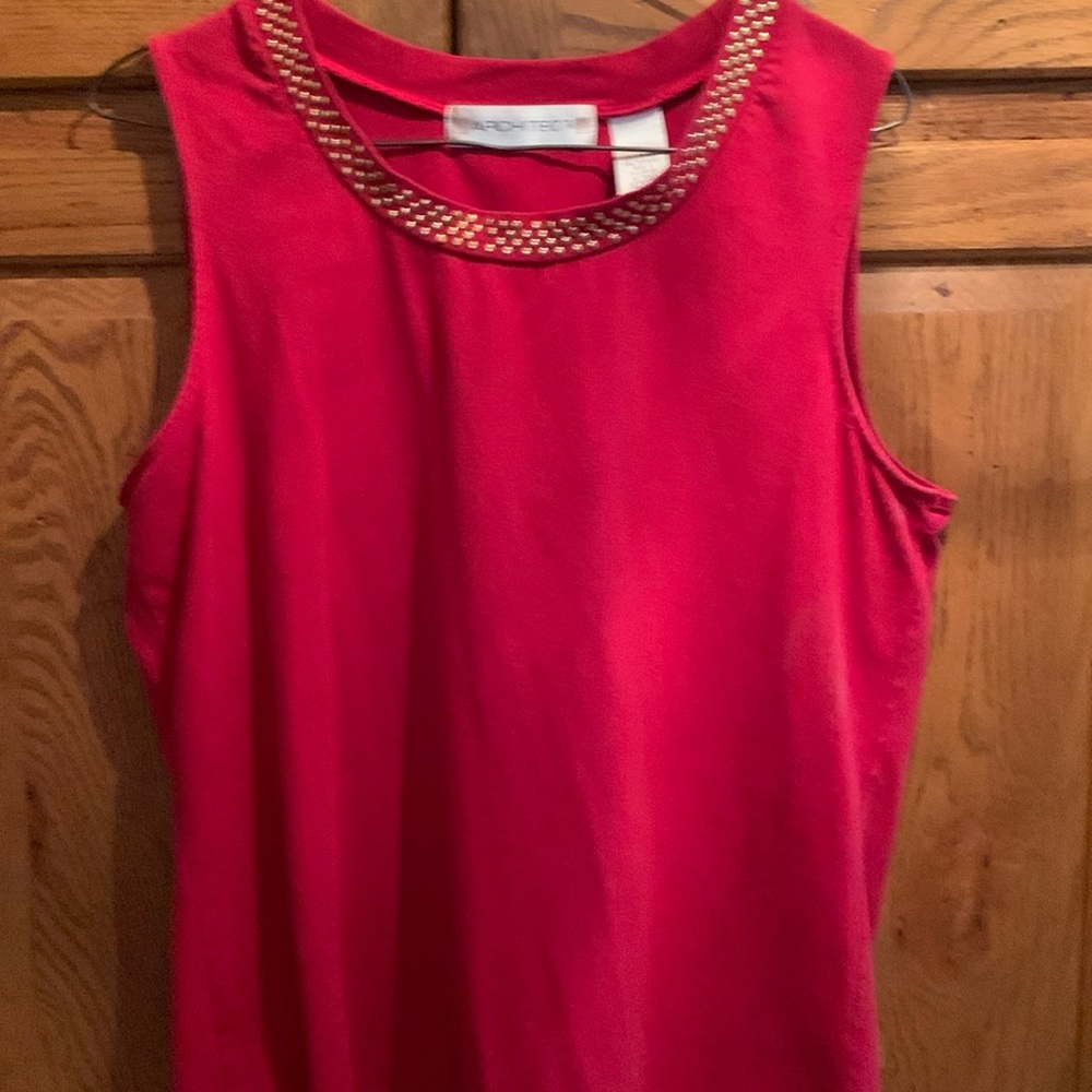 red sleeve less top with gold   beads around neck